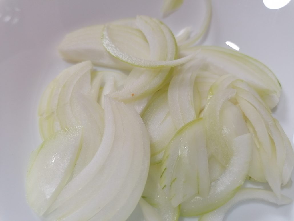 Sliced white onions
